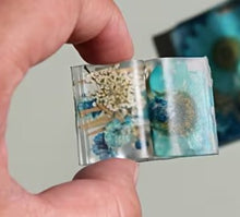 Memorial ashes in a resin dolphin sculpture.